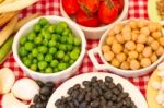 Variety Of Kitchen Ingredients With Fresh And Dried Legumes Stock Photo