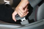 Business Woman Hand Fastening A Seat Belt Stock Photo