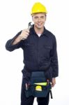 Young Worker Holding Spanner Stock Photo