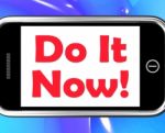 Do It Now On Phone Shows Act Immediately Stock Photo