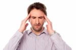 Man Having Severe Headache Stock Photo