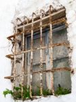 Rusting Bars Across A Window Of A Derelict Building In Casares S Stock Photo