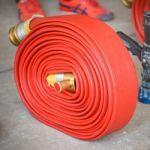 Red Hose Fire Stock Photo