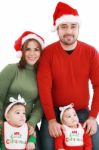 Happy Family In Christmas Costumes Stock Photo