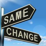 Change Or Same Signpost Showing Stock Photo