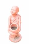 Buddhist Novice Holding Alms Bowl Clay Doll Isolated On White Stock Photo
