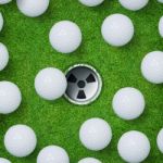 Abstract Golf Sport Background Of Golf Ball And Golf Hole On Gre Stock Photo