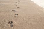 Footprints On Sand Stock Photo