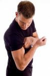 Man Showing His Muscles Stock Photo