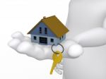 Hand Holding House And Key Stock Photo