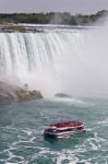 Beautiful Background With A Ship And Amazing Niagara Waterfall Stock Photo
