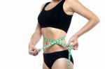 Fit Woman Measuring Her Waist, Cropped Image Stock Photo