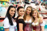 Gorgeous Young Women At German Funfair Stock Photo