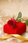 Red Rose And Gift Stock Photo