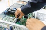 Man Fix Server Network In Data Center Room Stock Photo