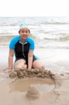 Girl Playing On Sea Beach Stock Photo