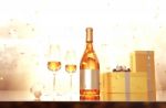 Scene Of Glasses Of Champagne,bottle Of Champagne And Gift Boxes Stock Photo