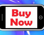 Buy Now On Phone Shows Purchasing And Online Shopping Stock Photo
