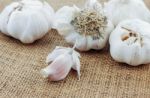 Garlic On Sackcloth Stock Photo