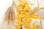 Italian Pasta Penne With Wheat Stock Photo