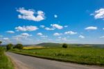 Road Through The Rolling Sussex Countryside Stock Photo