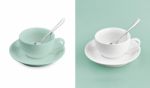 Cup On White & Turquoise Background Stock Photo