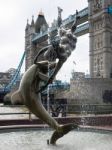 David Wayne Sculpture Girl With The Dolphin Next To Tower Bridge Stock Photo