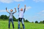 Enthusiastic Father And Son Outdoors Stock Photo