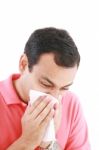 Man With Cold Blowing Nose Stock Photo