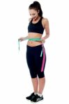 Slim Fit Woman Measuring Her Waist Stock Photo