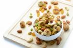 Mixed Nuts In White Bowl Stock Photo