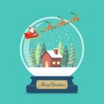 Merry Christmas Glass Ball With Santa Sleigh And Winter House Stock Photo