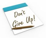 Dont Give Up! Notebook Means Determination And Success Stock Photo