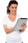Woman Using Tablet Device Stock Photo
