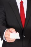 Businessman Showing Blank Card Stock Photo