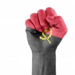 Flag Of Angola On Hand Stock Photo