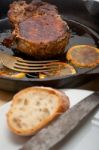 Pork Chop Seared On Iron Skillet Stock Photo