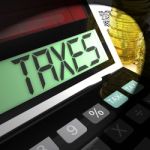 Taxes Calculated Shows Income And Business Taxation Stock Photo