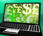 Currency Symbols On Laptop Showing Exchange Rate And Finance Stock Photo