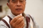 Man Holding Drug Stock Photo