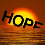 Hope Word Sinking In Sea Stock Photo