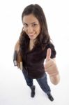 College Student Showing Thumb Up Stock Photo