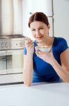 Woman Eating Cereal Stock Photo
