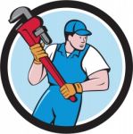 Plumber Holding Pipe Wrench Circle Cartoon Stock Photo