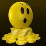 Surprised Smiley With Coins Shows Unexpected Earnings Stock Photo