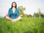 Young Woman Relaxing In Park Stock Photo