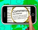 Commerce Definition On Smartphone Showing Commercial Activities Stock Photo