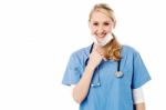 Smiling Young Female Surgeon Stock Photo
