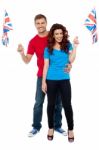 Young Couple Holding UK Flag Stock Photo