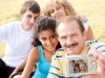 Attractive Family Pose For A Self Portrait Stock Photo